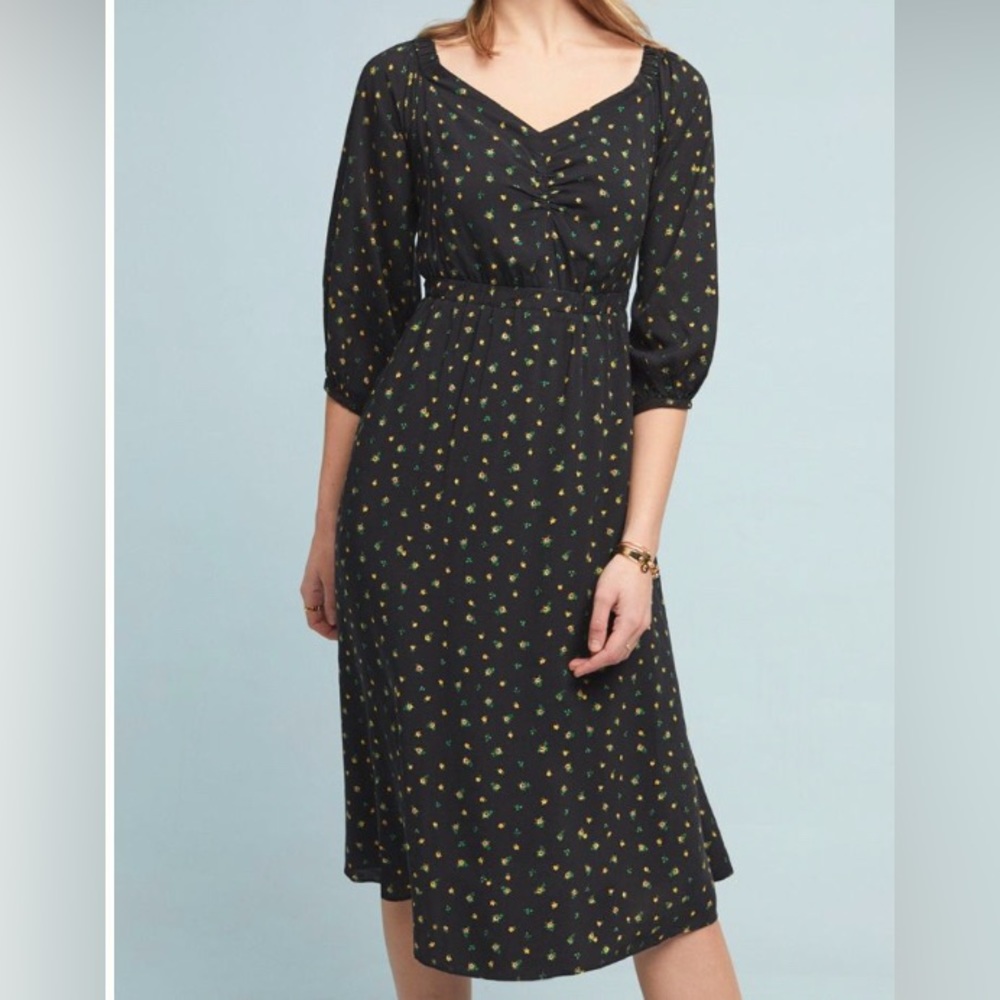 Black off the shoulder dress with yellow flowers